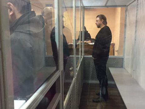Украинский арестант развлекает полицию шоу с переодеванием Украинский арестант развлекает полицию шоу с переодеванием